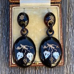 "Details: Stunning Victorian detailed inlay earrings with 9K gold and shell details. These earrings are magnificent, and very dramatic. They have etched gold inlay with sweet grape vine pattern. The grapes are made of tiny gold beads, the vines are etched gold, and the leaves are carved shell. Their are tiny stars at the top of the earrings! Absolutely stunning! The look is fabulous on, and would make an lovely addition to any collection. Please ask all necessary questions prior to placing an or Elegant Drop Earrings With Inlay, Elegant Inlay Earrings As Gift, Elegant Earrings With Inlay For Gifts, Vine Pattern, Cameo Earrings, Silver Heart Earrings, Tiny Star, Carved Shell, Gold Engraving