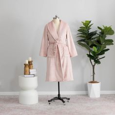 None of us get to visit the spa every day (wouldn't that be the life!), but for a daily mini-spa experience our VelvetLoft® Luxury Spa Robe is a must-have. The velvety plush fabric of our exquisitely soft robe seductively caresses the skin. Fabric: VelvetLoft® Size: Small/Medium is 45" long, 31" across (closed), and the sleeves are 22.5" long. Large/Extra Large is 49" long, 35" across (closed), and the sleeves are 24" long. Warmth: All season Fabric height: Medium For an extra special treat for Robe For Men, Berkshire Blanket, Mini Spa, Soft Robes, Luxury Spa, The Spa, Plush Fabric, Spa Experience, Extra Large