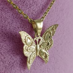 Introducing our exquisite Princess-themed Butterfly Shaped Filigree Necklace, crafted with precision and elegance to captivate the hearts of Princess enthusiasts and jewelry connoisseurs alike. This listing INCLUDES 18" cable chain. This stunning necklace is inspired by the opulent 18K Gold adorned with intricate Butterfly styling, creating a timeless and enchanting piece that celebrates the essence of Princess' allure.Handmade with love and attention to detail, our necklace features a delicate Elegant Cadmium-free Yellow Gold Necklaces, Elegant Yellow Gold Cadmium-free Necklace, Elegant Cadmium-free Round Pendant Necklaces, Delicate Butterfly, Filigree Necklaces, Butterfly Shape, Butterfly Pendant, Stunning Necklace, High Quality Jewelry