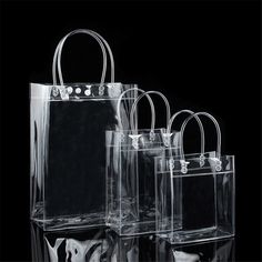 Main Material : PVC Item Type : shopping bags Color: Clear Weight: 60g Fit for: Travel, Office Equipment, Cosmetics Collection, Gift Packaging Package include1 x Clear Handbag Size: S 13*15*7cm M  17*23*7cm L 20*28*10cm Features: Durable PVC clear tote bag with snap. Suitable for workplaces that require clear bags and meets NFL and PGA Tournament guidelines. Hold camera, cell phone, hat, water bottle, and more. Works well for travel, students who need clear lunch bags, office workers, sports, an Transparent Handbags, Transparent Purse, Plastic Handbag, Clear Gift Bags, Plastic Gift Bags, Burlap Tote Bags, Clear Handbags, Handbags Collection, Collection Ideas