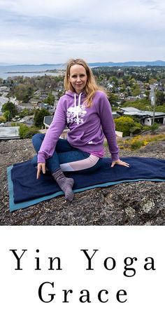 a woman sitting on top of a blue mat with the words yin yoga grace in front of her