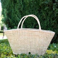 Born from earth and hand woven by the hands of Alma artisan from Tlamacazapa, Guerrero ,Mexico. Handwoven with sustainable palm leaves, this carryall tote is perfect for the beach or the farmer's market. Material: Palm Leaf Size : 23” W (top) 16” bottom 11” H Handles :5.5” drop all items are shipped from the USA. All Mi Mundo Mexicano items are 100% handmade by artisans in Mexico. Each stitch and item is completely unique and one-of-a-kind, so you'll never find two that are exactly the same! * P Leather Embroidery, Carryall Tote, Farmer's Market, Palm Leaf, Artisan Craft, Palm Leaves, Natural Materials, Hand Woven, The Beach