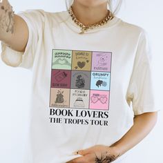 Reading Eras Book Tropes Sweatshirt Bookish Eras Shirt Book Lover Gifts for Readers Romance Book Tropes In my Reading Era Tropes Tour Shirt Comfort Colors introduces the "Comfort Colors 1717" garment-dyed t-shirt; a fully customizable tee made 100% with ring-spun cotton. The soft-washed, garment-dyed fabric brings extra coziness to your wardrobe while the relaxed fit makes it an excellent daily choice. The double-needle stitching throughout the tee makes it highly durable while the lack of side-seams helps the shirt retain its tubular shape. Discover all 58 colors in our Comfort Colors 1717 color charts below. .: The Comfort Colors 1717 tee is made with medium fabric (6.1 oz/yd² (206.8 g/m consisting of high quality, 100% ring-spun US cotton for long-lasting comfort. .: The relaxed fit kee Book Graphic Tees, Book Lover Tshirts, Romance Book Tropes, Book Tropes, Reading Rainbow, Book Tshirts, Book Clothes, Embroidered Sweater, Gifts For Readers