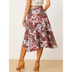 This skirt features a floral, self-tie wrap design, an asymmetrical hem, and a midi length, adding a flowy and charming feel to your vacation look. A flowy hem and tropical floral patterns make this skirt a perfect piece for summer vacation, trips, beaches, weekends, parties, holidays, etc. Paired with a crop top and sandals for many occasions. Summer Skirt With Tropical Print For Vacation, Floral Print Flowy Asymmetrical Wrap Skirt, Floral Print Flowy Skirt With Asymmetrical Hem, Asymmetrical Floral Print Flowy Wrap Skirt, Flowy Floral Print Skirt With Asymmetrical Hem, Flowy Asymmetrical Wrap Skirt With Floral Print, Asymmetrical Hem Floral Print Skirt, Summer Floral Print Skirt With Asymmetrical Hem, Red Summer Beach Skirt