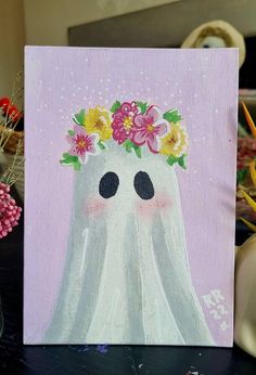 a painting of a ghost with flowers on its head