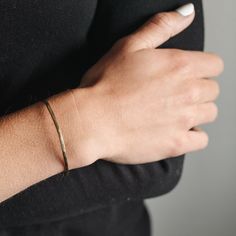 A stunning hammered finish, similar to our Bristol ring. The cuff style opening makes it easy to put on and take off, and it allows for you to comfortably size the bracelet to your wrist. Modern Tarnish-resistant Cuff Bracelet For Everyday, Modern Everyday Cuff Bracelet, Tarnish Resistant, Minimalist Adjustable Open Cuff Bangle, Modern Polished Finish Open Cuff Bracelet, Adjustable Modern Gold-plated Cuff Bracelet, Earring Necklace, Put On, Sterling Silver Bracelets, Bristol