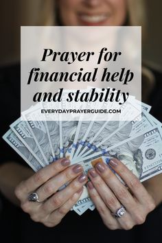 a woman holding money with the words prayer for financial help and stabiity