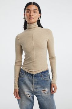 Description Crafted from our signature mid-weight stretch-rib, the Mads is a turtleneck top accented with tonal baby flat lock stitch, a fold-over turtleneck, and a curved hem. Pairs well with oversized trousers, slip skirts, and your favorite denim. Composition & Care 95% Rayon 5% Spandex  Garment care: Turn garme Oversized Trousers, The Line By K, Line By K, Lock Stitch, Slip Skirts, Womens Turtleneck, Turtleneck Top, Mens Fall, Cool Boots