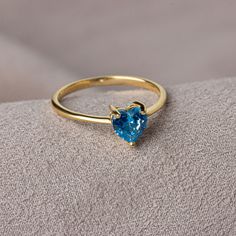 We crowned the heart symbol, which is a symbol of love, friendship and many other affections, with precious stones. Now you can see the love at your finger. Other Products Compatible with Our Blue Topaz Heart Ring: https://artdiamonds.etsy.com/listing/1391133396/blue-topaz-heart-necklace14k-solid-gold?utm_source=Copy&utm_medium=ListingManager&utm_campaign=Share&utm_term=so.lmsm&share_time=1694013074312 F E A T U R E S * Made to Order. * Gold KT: 14K * Gold Color: Yellow Gold, Rose Gold, White Gold * Blue Topaz Carat: 1.00 ct. * Stone Height: 7,12 mm / 0.28 inch * Stone Width: 6,12 mm / 0.24 inch * Setting Type: Bezel Setting * Ready to Ship in 1-3 Business Days * 100% US sourced * 2 Years Warranty * Free Express International Shipping * Free returns within 14 days from the order date Heart Heart-shaped Blue Topaz Birthstone Jewelry, 14k Gold Heart Cut Birthstone Ring, Gift Heart Cut Blue Topaz Rings, Heart Cut Blue Topaz Ring As A Gift, Heart Cut Blue Topaz Ring For Gift, Heart Cut Blue Topaz Birthstone Jewelry, Blue Birthstone Rings For Valentine's Day, Blue Heart Cut Birthstone Ring, Heart-shaped Topaz Promise Ring