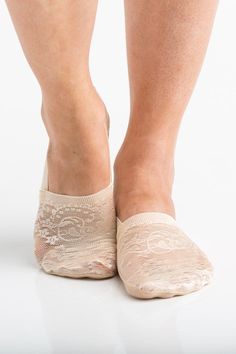 Lightweight, no show, no slip socks give you the layer you need without adding any extra bulk.Sold in Packs of ThreeFloral Lace Design90% Acrylic/ 10% SpandexNo-slip design - Silicone lining inside and on the solePlenty of stretch - will comfortably fit women's size 5-10Perfect for Low profile shoes including sneakers, loafers, etc. Style: socks Print / Pattern: floral design Fabric Contents: 90% Acrylic/ 10% Spandex Non-slip No-show Socks For Summer, Non-slip No-show Summer Socks, Comfortable No-show Socks For Spring, Comfortable No-show Spring Socks, Non-slip Micro-elastic No-show Socks, Spring Stretch Beige Socks, Beige Stretch Socks For Spring, Socks Print, Christmas Coat