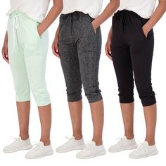 Looking for the perfect pair of joggers for your active lifestyle or casual wear? Look no further than our Women's Soft Capri Joggers! Our 3-pack of joggers are designed to keep you comfortable and stylish no matter what the occasion. Our Women Running Bottoms are made from soft and warm material that's perfect for all-season wear. The drawstring waist and cuff hem provide a comfortable and secure fit that stays in place no matter how active you are. With a range of sizes available, our Capri Jo Capri Joggers, Jogging Style, Soft Sweatpants, Stylish Activewear, Sweatpants With Pockets, Soft Joggers, Plus Size Pajamas, Comfortable Pants, Running Yoga