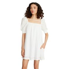 This rayon crinkle Smocked Mini Dress from Luv Betsey features short eyelet puff sleeves and a square neckline with smocking detail. The A-line babydoll silhouette makes this adorable mini an effortless essential for all your springtime activities. Size: XL.  Color: White.  Gender: female.  Age Group: adult. Springtime Activities, Rayon Crinkle, Smocked Mini Dress, Dress Closet, Fitted Mini Dress, Betsey Johnson Dresses, Square Neckline, Puff Sleeves, Betsey Johnson