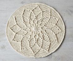 the crocheted doily pattern is shown in three different stages, including two circulars and one round