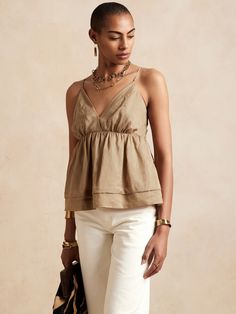 Everyday luxury, this comfortable v-neck camisole is crafted from ancient, linen-like ramie fabric for lightweight and breezy movement with a distinctive finish that softens with every wear.  FIT & FLARE: Empire waist, swing body.  V-neck with empire Ramie Fabric, Empire Waist Top, Gilda Radner, Flamboyant Gamine, Crinkle Top, Cord Set, Everyday Luxury, Top Banana, Iced Latte