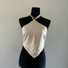 Size Xs Never Worn Very Cute And Backless White Fitted Halter Neck Top, Cream Sleeveless Top For Night Out, Fitted Beige Top For Night Out, Fitted Beige Party Top, Fitted Cotton Halter Top For Night Out, Cream Sleeveless Fitted Top, Cream Fitted Sleeveless Top, Fitted Sleeveless Cream Top, Fitted Cream Halter Neck Top