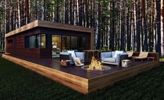 an outdoor living area with couches and fire pit