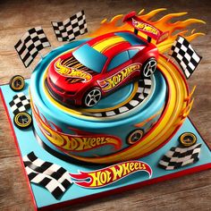 a birthday cake with a hot wheels theme on the top and flames coming out of it