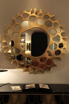 a mirror that is on the side of a wall