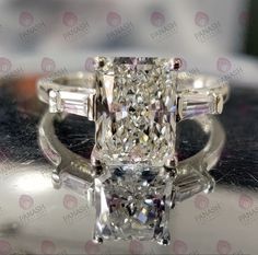 an engagement ring with a princess cut diamond