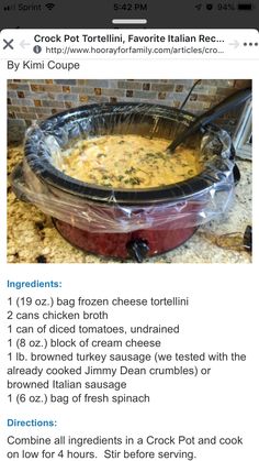 a crock pot filled with food sitting on top of a counter