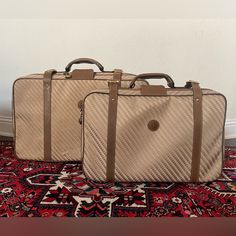 The Classic Gucci Luggage Is Crafted Of Signature Gg Monogram On Canvas From The 1970’s. The Bag Features Leather Trim, Gucci Canvas, Rolled Leather Top Handle, Flap Lock Closure, Gold Tone Hardware Including Locks For Both Luggages. Missing The Keys For It. The Zippers Open To A Spacious Fabric Interior. Good Vintage Condition. Scuffs On Leather Shown On The Picture. Interior Is In Excellent Condition. Hardware On The Bottom In Very Good Condition. Bigger Luggage Dimensions: 25.5” Width, 8” Dep Gucci Luggage, Travel Luggage Set, Suitcase Travel, Gg Monogram, Suitcase Traveling, Luggage Sets, The Keys, Leather Top, Leather Trim