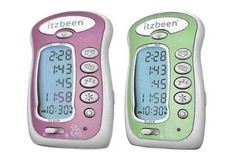 two electronic clocks sitting next to each other on a white surface with the words itzbeen