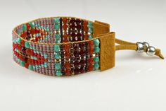 Beaded Boho Bracelet in Lavender, Red & Turquoise  Geometric Design - Loomed Statement Jewelry Bohemian Cuff Bracelet With Round Beads For Festivals, Bohemian Festival Cuff Bracelet With Round Beads, Bohemian Beaded Cuff Bracelet, Bohemian Multicolor Cuff Bracelet, Adjustable Beaded Bohemian Cuff Bracelet, Bohemian Cuff Bracelet With Colorful Beads For Festivals, Bohemian Adjustable Bracelets With Faceted Beads, Bohemian Adjustable Friendship Bracelets With Faceted Beads, Bohemian Beaded Bracelets With Faceted Beads For Jewelry Making