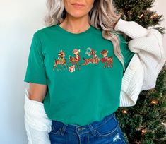 Christmas Reindeer Shirt, Vintage Deer Shirt, Christmas Animal Shirt, Retro Reindeer Shirt, Xmas Crewneck, Holiday Tshirts, Christmas Gift, Christmas Shirts, Animal Lover Shirt, Christmas Presents, Reindeer Christmas, Merry Christmas, Reindeer Shirt, Cute Christmas Shirt, Womens Clothing, Reindeer Sweatshirt 🦌This Christmas Reindeer Shirt is a perfect gift for everyone! Our shirts are made with the highest quality materials & are super soft, comfy & cozy! 🦌 🟢 HOW TO ORDER 🟢 1. Check and Review ALL Photos 📷 2. Select Your T-Shirt Style, Size and T-Shirt Color from drop down menus ✨ 3.Select Your Design Print Color from images and mention in personalization section (Optional)🎨 4. Add to cart & place order 🛒 We're constantly striving to provide excellent service. We'd love to get your Retro Reindeer, Deer Shirt, Reindeer Shirt, Snoopy T Shirt, Cute Christmas Shirts, Vintage Deer, Snoopy Christmas, Animal Shirts, Christmas Animals