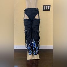 Namilia Size Xs Black With Blue Flame Motocross Chaps Pants. In Good Condition And Come From A Smoke Free Home. All Approximate Flat Measurements Listed Below. Total Length: 44” Waist: Relaxed- 12.5”/ Fully Extended- 15” Rise: 12.5” Inseam: 31.5” Leg Opening Width: 8” Blue Flames, Blue Black, Cut Out, Pant Jumpsuit, Pants For Women, Pants, Women Shopping, Blue, Black