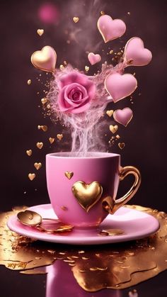 a pink coffee cup with steam rising out of it and hearts flying out of it