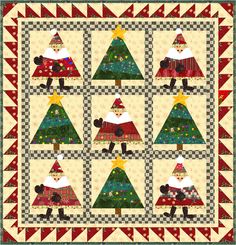 a quilted christmas tree with santa claus on top and other decorations in the middle