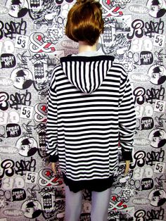 "Womens sweatshirt Vintage ladies sweatshirt Womens pullover black white sweatshirt striped sweatshirt striped pullover hooded Sweatshirt Size L height of the woman in the photo - 180 cm Please refer to photos for details of condition. Condition: used, signs of age and wear see pictures Measurements: Length: 74 cm/ 22.44 \" Shoulder to shoulder: 48 cm/ 24.8 \" Sleeve 67 cm/26.77 \" Bust: 104 cm/42.52\" Waist 102 cm/41\" Hips: 102 cm/ 41\" Size L note The color on the pictures may vary due to mon Striped Long Sleeve Sweatshirt For Winter, Casual Winter Sweatshirt With Contrast Stripes, Oversized Striped Sweater For Streetwear, Striped Long Sleeve Hoodie For Fall, Casual Striped Sweatshirt For Streetwear, Casual Striped Hooded Top, Casual Striped Winter Hoodie, Striped Hooded Tops For Fall, Striped Winter Sweatshirt With Ribbed Cuffs