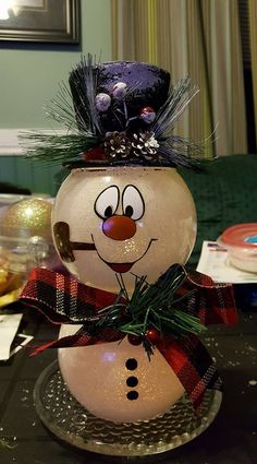 a snowman sitting on top of a table