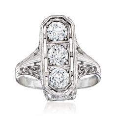 Ross-Simons - C. 1930 Vintage .75ct t. w. Diamond Filigree Ring in 18kt White Gold. Size 5. C. 1930. Hailing from the Art Deco era of design, our Estate collection ring is one to treasure. A trio of twinkling .75 ct. t. w. round Old European-cut diamonds file along the stylish openwork band. Lovely filigree designs are visible all around, and spill onto the tapered band. Keep this beauty for yourself, or gift it to one who appreciates its historical origins. Crafted in 18kt white gold. 5/8" wide. Diamond filigree ring. Exclusive, one-of-a-kind Estate Jewelry. Diamond birthstones are the perfect gift for April birthdays. Antique Platinum Three Stone Diamond Ring, Antique Platinum Three Stone Rings, Antique Three Stone Platinum Rings, Antique Three Stone Diamond Ring For Formal Occasions, Estate Platinum Diamond Ring With Diamond Cut, Art Deco Three Stone Ring For Formal Occasions, Formal Art Deco Three-stone Diamond Ring, Estate Platinum Diamond Ring With Brilliant Cut, Estate White Gold Diamond Ring