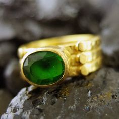 "ARTSMYRNA METAL: 925k Silver GEM: Emerald ( lab created ) Diameter Stone Size: 10x8 mm COATING: 24k gold over (We can made a special type of coating for your personal preference ) MATERIEL : 925K Sterling Silver ( Some of my items vermeil gold over silver for looks rich . But i can finish in silver too ) RING SIZE: 6 (your desired size is made) GEM FEATURES AND BENEFITS Features : It is the divine gem of Goddess Venus. It is also known as \"Healer Stone\". It has the ability to maintain emotion Unique Green Stackable Promise Rings, Modern Stackable Emerald Ring For A Gift, Modern Stackable Emerald Ring As A Gift, Modern Stackable Emerald Ring As Gift, Modern Stackable Emerald Ring Gift, Fine Jewelry Green Oval Stackable Rings, Handmade Green Stackable Rings For Gift, Modern Green Gemstone Stackable Rings, Handmade Green Stackable Rings For May Birthstone