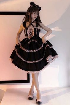 Fabric: Cotton Color: Black/Pink Feature: Triple-Layered, Ruffle, Bowknot, Lace Include: Dress*1 (Any of the accessory is not included.) Size (IN) Bust Waist Length S 33.07-34.65 - 37.01 M 34.65-36.22 - 37.40 L 36.22-37.80 - 37.80 Size (CM) Bust Waist Length S 84-88 - 94 M 88-92 - 95 L 92-96 - 96 Feminine Sleeveless Dress For Costume Party, Pink Bow Dress For Costume Party, Pink Balletcore Mini Dress With Ruffles, Pink Ruffled Mini Dress In Balletcore Style, Black Spring Dress With Attached Cancan, Pink Lace Trim Dress For Costume Party, Balletcore Ruffle Dress For Costume Party, Ruffled Balletcore Dress For Costume Party, Pink Balletcore Dress For Costume Party