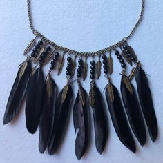 Black Feathers And Black Breads On A Bronze Tone Chain With Extender So Pretty On! Approximately 16’ Without Ext Bundle And Save! Adjustable Black Feather Jewelry, Black Feathered Jewelry For Festivals, Black Feathers, So Pretty, Womens Jewelry Necklace, Feathers, Black And Brown, Statement Necklace, Jewelry Necklaces