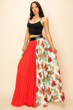 Our Women's Pleated Multi Print Maxi Skirt with Elastic Band is a statement piece for any wardrobe. Crafted from lightweight yet sturdy fabric, it features a unique pleat design with a flexible elastic band for a comfortable, flattering fit. The vibrant prints create a bold, chic look, perfect for any special occasion. A stunning addition to any closet. 100% POLYESTER Red Stretch Skirt For Vacation, Casual Flowy Maxi Skirt With Accordion Pleats, Summer Stretch Skirt With Accordion Pleats, Stretch Summer Skirt With Accordion Pleats, Stretch Accordion Pleat Skirt For Summer, Trendy Pleated Maxi Skirt For Summer, Summer Maxi Skirt With Accordion Pleats, Red Summer Skirt With Elastic Waistband, Red Tiered Maxi Skirt With Elastic Waistband