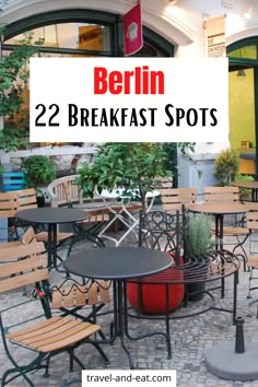 an outdoor cafe with wooden tables and chairs in front of the restaurant sign that says berlin 22 breakfast spots