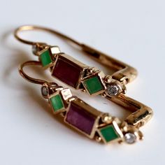 Pollaiuolo 14k Gold, Garnet, Emerald and Diamond Earrings Emerald And Diamond Earrings, Emerald Diamond Earrings, Replica Jewelry, Lapis Earrings, Zambian Emerald, Rhodolite Garnet, Emerald Earrings, Emerald Diamond, Jewelry Patterns