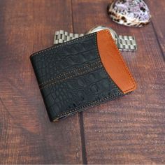 -This Bifold wallet is made of real premium leather that lasts and stands the test of time with great functionality. -It is unique, soft to touch, and double stitched for its durability. -RFID secured that prevents unauthorized scans of credit cards and personal information stored on RFID chips. -Stylish design with great functionality- It holds 10+ cards with 2 ID windows and a lot of cash. -Gift Box - Ideal for the most special gifts for your friends and family like Groomsmen, Birthdays, Anniversaries, Father's Day, Christmas and other Special Occasions. Black Leather Wallet As Gift, Black Wallets With Card Slots For Father's Day, Father's Day Black Wallets With Card Slots, Leather Trifold Wallet For Father's Day, Brown Leather Trifold Wallet For Father's Day, Leather Anniversary Gift, Leather Anniversary, Anniversary Gift For Him, Cash Gift