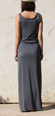 "Gray summer maxi dress has been best seller every summer It is made of soft Jersey with elastic waist This sleeveless maxi dress is designed with blouson bodice and straight maxi skirt Fit is absolutely comfortable yet flattering It is simple and stylish for any occasion for warm days -Scoop Neckline -Gathered elastic cinches waist -Made of high quality soft jersey fabric *Material - rayon / lycra *Care - machine wash cold delicate, no chlorine bleach, tumble dry, low / warm iron *Model is 34\" Casual Gray Maxi Dress For Summer, Casual Gray Stretch Maxi Dress, Summer Cotton Stretch Maxi Skirt, Summer Stretch Cotton Maxi Skirt, Spring Stretch Gray Maxi Dress, Stretch Longline Maxi Dress For Summer, Gray Stretch Maxi Dress For Spring, Casual Stretch Maxi Dress For Summer, Casual Longline Maxi Dress For Summer