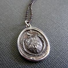 Patience and Courage Necklace  Wax Seal by PlumAndPoseyInc on Etsy Commemorative Pendant Locket Jewelry, Antique Pendant Jewelry For Commemoration, Antique Oxidized Finish Necklaces For Anniversary, Antique Oxidized Finish Necklace For Anniversary, Commemorative Medallion Pendant Jewelry, Commemorative Medallion Jewelry With Large Pendant, Antique Silver Soldered Pendant Jewelry, Elegant Locket Jewelry For Commemoration, Commemoration Jewelry With Large Pendant