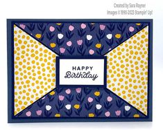 a happy birthday card with flowers and polka dots