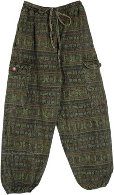 A pair of tropical bohemian handmade Om and Hare Ram print wide leg style pants closed at ankle.  These pants feature a mesmerizing inspired print and style that channels the free-spirited vibes of the 60s and 70s. #tlb #SplitSkirtsPants #bohemianfashion #Handmade #hippieharempants Vintage Wide Leg Cargo Pants For Summer, Multicolor Printed Hippie Bottoms, Bohemian Green Printed Pants, Bohemian Relaxed Fit Printed Pants, Boho Print Wide Leg Cotton Bottoms, Wide Leg Cotton Bottoms With Boho Print, Green Bohemian Wide Leg Pants, Casual Green Boho Print Bottoms, Wide Leg Boho Print Cotton Bottoms