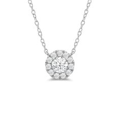 That one piece that will inject a shot of glamour into your looks. This white gold necklace features round diamond surrounded by a halo of smaller round diamonds. Four prongs secure the center diamond in place. The timeless look of this necklace allows you to pair it with almost any of your favorite outfits. Diamond White Solitaire Necklace With Halo For Anniversary, Classic Cubic Zirconia Diamond Necklace With Halo, Round Diamond Solitaire Necklace With Halo Design, Diamond Necklace With Halo Setting And Round Stone, White Gold Diamond Necklace With Halo, Diamond White Necklace With Halo Setting And Round Stone, Formal Diamond Necklace With Halo, Classic Halo Diamond Necklace In Cubic Zirconia, Timeless Cubic Zirconia Diamond Necklace With Halo