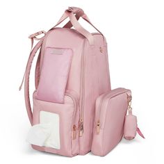 a pink backpack and diaper bag sitting next to each other