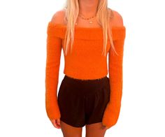 Embrace Fall in Style Introducing the Persimmon Off Shoulder Sweater, your new go-to piece for the autumn season! This chic sweater is designed to make a statement while keeping you cozy and comfortable. Key Features: Off Shoulder Design: Show off your stylish side with a trendy off-shoulder silhouette that is both flirty and fashionable. Fuzzy Texture: Crafted from soft, fuzzy fabric, this sweater provides warmth without sacrificing style, perfect for those brisk autumn days. Versatile Color: T Cozy Off-shoulder Winter Tops, Soft Knit Off-shoulder Sweater, Off-shoulder Soft Knit Sweater, Fuzzy Fabric, Off Shoulder Design, Fuzzy Texture, Chic Sweater, Autumn Days, Cozy Autumn