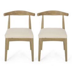 a pair of wooden chairs sitting next to each other