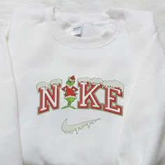 The Nike x Grinch Xmas Embroidered Sweatshirt is the perfect festive attire for the holiday season. Made with high-quality materials, this sweatshirt features intricate embroidery of the iconic Grinch character, adding a touch of whimsy to your wardrobe. The soft and comfortable fabric ensures a cozy fit, while the stylish design allows you to showcase [...] Cute Nike Hoodies, 17th Birthday Gift Ideas, Jorgen Von Strangle, Sweater And Shirt, Nike Cartoon, Nike Hoodies, Nike Inspired, Nike Stuff, Timmy Turner